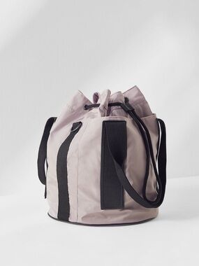 Fabletics Pale Pink Drawstring Bucket Bag with Black dbl Straps